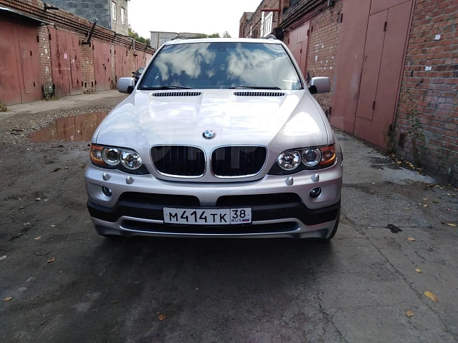 картинка Передняя юбка в стиле 4.8 для Bmw X5 E53 Рестайлинг магазин  StreetTuning 